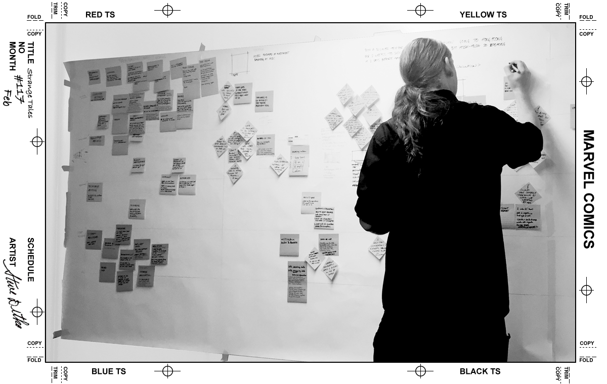Developer drawing up a plan of a customer journey at a kick off meeting